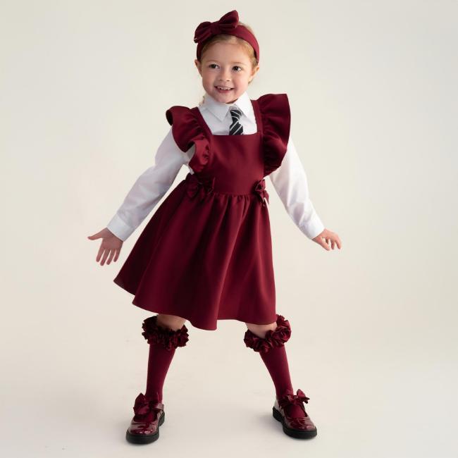 Picture of Caramelo Kids Girls Frill School Pinafore With Bows - Maroon Burgundy