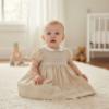 Picture of Sarah Louise Girls Smocked Bodice Puff Sleeve Dress - Beige Ivory